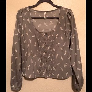 Long sleeve blouse with feathers
